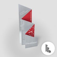 the business card is designed to look like an origami clock with red and grey triangles