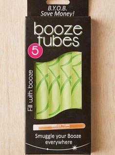 a package of booze tubes sitting on top of a wooden table