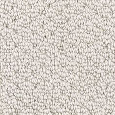 an up close shot of the texture of a carpet with white and gray colors on it