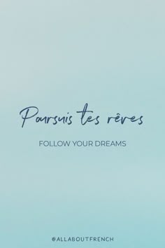 a blue sky with the words, paris les reves follow your dreams