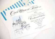 a wedding card with an image of a castle on the front, and a ribbon attached to it