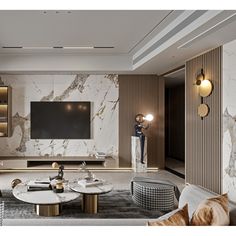 a living room with marble walls and furniture