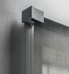 a shower head mounted to the side of a wall