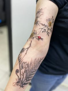 a person with a tattoo on their arm