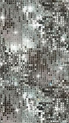 an abstract silver and black mosaic tile pattern with sparkles on the edges stock photo