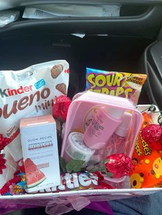 a car trunk filled with snacks and candy