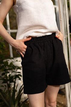 Black Linen & cotton shorts with pockets, high waisted womens linen shorts, Farmhouse cotton shorts Perfect summer shorts for any woman!  Our women's summer linen & cotton shorts are made of soft natural fabric that is comfortable and breathable.  Material: Linen 52% Cotton 48% Available in sizes XS to L The elastic waistband ensures a perfect fit, and the casual model creates a stylish image.  The shorts have two pockets, ideal for carrying small items or just giving extra style.  The fabric is light and airy, which makes them ideal for wearing on hot summer days on the beach or on business in the city.  They can also be combined with a T-shirt to create a fashionable version of an office suit. With these shorts, you can create the perfect look for every day!  High-quality materials and c Womens Linen Shorts, Linen Shorts Women, Summer Linen, Natural Fabric, Soft Natural, Linen Shorts, Black Linen, Skorts, Natural Fabrics