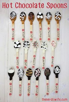 there are many spoons that have chocolate spoons on them, and the words hot chocolate spoons