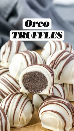 chocolate covered truffles on a cutting board with the words oreo truffles above them