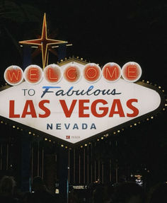 the welcome to fabulous las vegas sign lit up at night