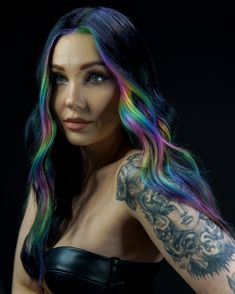 🌈 Elevate your hair game with prism magic! 🌟 Immerse in the playful hues of rainbow vivid block colors, each shade telling a story of its own. ⚡️ Contrast is the key – introducing the deep allure of black to make your locks pop! 🖤✨ Dive into the spectrum of style! #PrisimHairColor #RainbowVivid #BlackContrast Rainbow Peekaboo Hair Black, Black With Rainbow Hair, Black Rainbow Hair, Hidden Rainbow Hair Black, Summer Hair Color For Blondes, Dark Hair Rainbow Highlights, Hair Color For Blondes, Prism Hair, Rainbow Color Blocking Hair