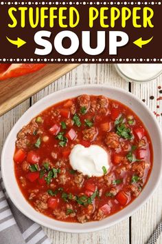 a bowl of stuffed pepper soup with sour cream on top and the words stuffed pepper soup above it