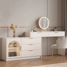 a white desk with a mirror, chair and vase on the table in front of it