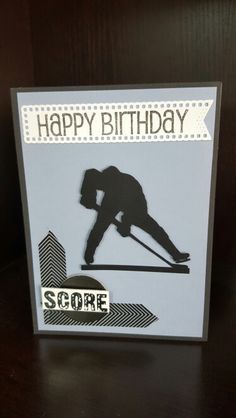 a happy birthday card with a silhouette of a skier