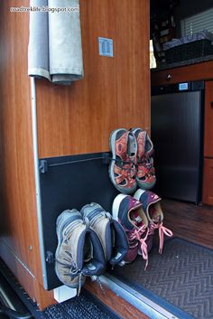 shoes are lined up on the back of a vehicle