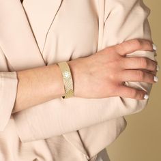 Our Golden Mae Medical ID Cuff is durable, yet has a delicate look with its pearlescent inlay over a gold tone finish. This adjustable, hypoallergenic women's medic alert cuff features extra elements of added safety without sacrificing style.

Two medical caduceus symbols: one on each side
The words, �Med Info Here� inscribed on one cuff end
The internationally recognized medical caduceus symbol is designed to alert Emergency Medical Personnel to your medical information, discreetly custom engra Medical Caduceus, Caduceus Symbol, Engraved Cuff, Medical Id Bracelets, Medical Bracelet, Id Bracelets, Medical Information, Cross Design, In Case Of Emergency