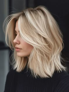 The blond lob is the quintessence of spring’s vivacity. This haircut is a modern-day charm, with its perfect balance between the shortish vibe of a bob and the manageability of medium short layered hair. Its subtle layers bring out a thick bob appeal that’s neither too heavy nor too light, perfect for those with haircuts shoulder length thick hair. The color is a delightful mix of golden and ashy hues, offering a sun-kissed glow that’s ideal for the warmer days ahead. Spring Haircuts, Shoulder Length Blonde, Blonde Hair Transformations, Blonde Hair Inspiration, Blonde Hair Looks, Shoulder Length Hair Cuts, Short Blonde Hair, Shoulder Length Hair, Medium Length Hair Cuts