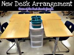 a desk with two bins on it and the words new desk arrangement over top