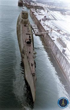 an aerial view of a submarine in the water