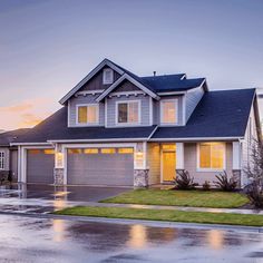 a house that is sitting in the rain