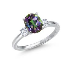 a white gold ring with an oval cut green and purple diamond surrounded by three diamonds