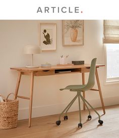 a desk with a chair next to it and pictures on the wall behind it that say article