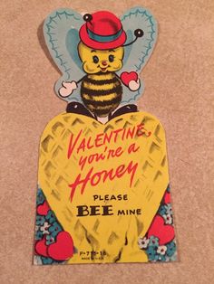 a valentine card with a bee on it