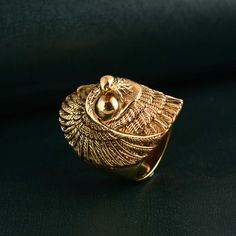 Golden eagle ring, Eagle jewelry, Gold Bird ring, King of sky ring, handmade ring, personalized gift, minimalist ring, statement ring, gifts Metal:- Brass ✦ Our rings are made of high-quality Brass metal and are carefully crafted by hand in our family workshop. The brass metal will develop a nice antique color over time. So, I suggest cleaning it once in a while for getting back to the shiny original color. You can use natural ingredients like lemon or vinegar with water to clean it. Also, apply Adjustable Wing-shaped Jewelry For Gifts, Adjustable Wing-shaped Jewelry Gift, Symbolic Rings With Unique Design For Gift, Unique Gold Wing-shaped Jewelry, Elegant Adjustable Wing-shaped Jewelry, Gift Open Metal Ring Jewelry, Symbolic Metal Ring Jewelry As A Gift, Fine Jewelry With Unique Design As A Gift, Spiritual Ring With Unique Design