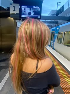 Hair Pink Streaks, Blonde Hair Colorful Highlights, Colorful Streaks In Hair, Layered Hair Color Ideas, Pop Of Color In Blonde Hair, Blonde Hair With Streaks, Blonde Hair With A Pink Streak, Blonde With Vivid Color, Colourful Highlights