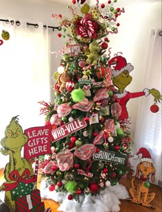 Grinch themed Christmas Tree, most grinch decorations are from hobby lobby with the exception of a few diy ornaments. Merry Grinchmas Tree, The Grinch Xmas Tree, Mr Grinch Christmas Tree, Gringe Christmas Tree Decor, Grinchmas Tree Decorations, Grinch Home Decor Christmas Decorations, Grinch Xmas Decorations