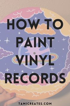 a hand holding a plate with the words how to paint vinyl records