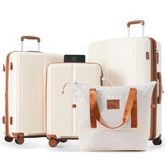 three pieces of luggage sitting next to each other