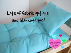 a bed that has some pillows on top of it with the words, lots of fabric options and blankets too