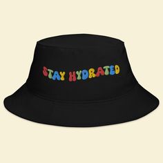 Keep the festival spirit alive with our "Stay Hydrated" Bucket Hat. This hat isn't just an accessory; it's a reminder to take care of yourself and spread positive vibes while you groove to the beats of EDM, Rave, and your favorite music festivals. 🎵 Key Features 🎵 Premium quality fabric for all-day comfort Unique design that promotes staying hydrated and positive vibes Trendy bucket hat style that adds flair to your festival attire One size fits most for convenient wear 🌈 Festival Vibes 🌈 Wh Festival Merch, Rave Hats, Festival Outfit Inspiration, Edm Fashion, Bucket Hat Style, Outfit Rave, Rave Edm, Festival Attire, 33rd Birthday