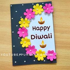 a happy diwali card with flowers on it