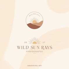 the wild sun rays photography logo is shown on a beige and white background with waves