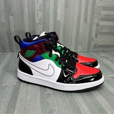 These Jordan 1 Mid Se Sneakers Are A Must-Have For Any Sneaker Enthusiast. Featuring A Black And White Upper With Multi-Color Accents Throughout, Including On The Nike Swoosh And Tongue Tag. The Midsole Is White With A Black Outsole, And The Upper Is Constructed Of A Mix Of Materials, Including Patent Leather. These Sneakers Are Women's Size 6.5 And Are Perfect For Any Casual Or Athletic Occasion. Don't Miss Out On Adding These Stylish And Comfortable Sneakers To Your Collection! New With Box Sneakers Multicolor, Nike Shoes Jordans, Color Accents, Nike Swoosh, Comfortable Sneakers, Jordan 1 Mid, Sneaker Collection, Jordan Shoes, Jordan 1