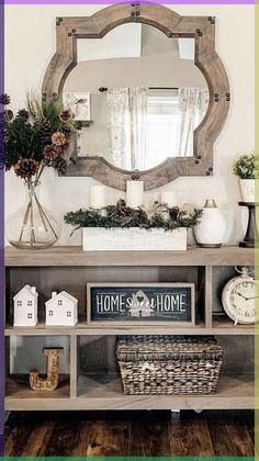 a living room filled with furniture and a mirror on top of a wooden shelf next to a window