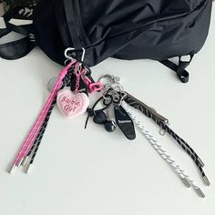 Personalize your purse or bag with a keyring charm 🤍 Please note: - Bag is NOT included in the purchase. - Only keychain/ charm is available for sale. Ships from South Korea.  Order is processed next day and it takes 10-15 days to arrive.   No returns or exchanges. * Please refer to the picture for sizing details Trendy Bag Charm With Key Clip For Everyday Use, Trendy Travel Bag Charm Keychain, Trendy Bag Charm Keychain For Everyday Use, Trendy Pink Keychain For Everyday Use, Trendy Black Keychain With Key Leash, Trendy Travel Keychains With Key Clip, Trendy Pink Travel Keychain, Trendy Black Keychains, Bow Bag