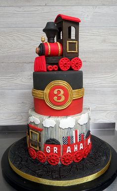 a birthday cake made to look like a train engine