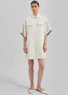 Color: Natural  Lightweight woven fabric Mini length Pointed collar Drop shoulders Front flap pockets Front button closure Unlined 100% Viscose  Dry Clean By Matin. Made in Australia The Frankie Shop, Frankie Shop, Lucca, Pocket Dress, Flap Pocket, Drop Shoulder, Woven Fabric, Australia, Mini Dress