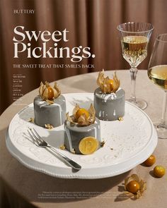 an advertisement for sweet pickings on a table with wine glasses and utensils