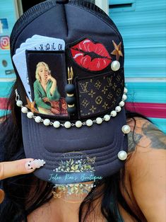 Lady Luck Trucker Hat – Julee Rae's Boutique Bandana Under Hat, Red Yankees Hat Outfit, Locs And Hats, Diy Trucker Hat Ideas, Trucker Hats With Patches, Hat Decorating Ideas, Custom Hat Ideas, Trucker Hat Designs, Trendy Trucker Hats