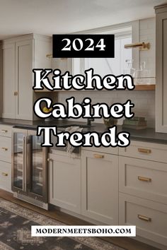 a kitchen with white cabinets and black counter tops that reads, 2021 kitchen cabinet trend