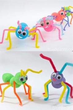 three different colored plastic toys with eyes and legs, one in the shape of a spider