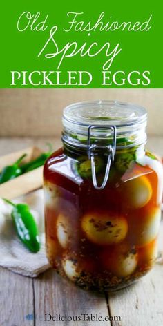 pickled eggs in a mason jar with green peppers