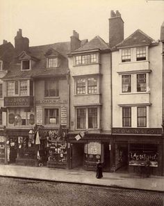 an old black and white photo of some buildings