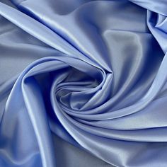 Silk Satin with Elastane Natural Fabrik Sky Blue color plain dyed fabric Width: 55.12 inch ( 140cm) listed for one Yard  Colors: Bright Light Blue Materials: 95% silk, 5% Elastane 16 mm Made in Italy Natural silk fabric is a luxurious and highly prized material that is made from the cocoon of the silkworm.  It has a soft, lustrous texture and is known for its durability and strength.  Silk fabric is often used in high-end fashion and home decor due to its natural sheen and drape. Soft and romant Blue Palette, Blue Texture, Bridal Fabric, Premium Colors, Fabric Texture, Natural Silk, High End Fashion, Fabric Width, Silk Satin