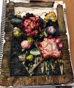 a piece of art that has been altered to look like flowers