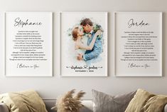 a couple's wedding vows are hung on the wall above a couch with pillows